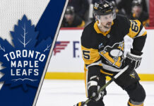 Erik Karlsson skates with the puck, looking for a passing lane, representing the offensive firepower he could bring to the Toronto Maple Leafs.
