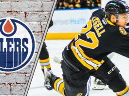 An action shot of Boston Bruins forward Fabian Lysell skating during an NHL game, with Edmonton Oilers logo to the left