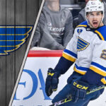 St. Louis Blues forward Jordan Kyrou skates with the puck during an NHL game, amidst ongoing offseason NHL trade rumors.