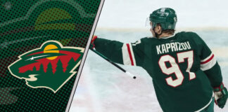 Minnesota Wild superstar Kirill Kaprizov looking focused during an NHL game as he contemplates his next contract.