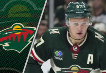 Minnesota Wild forward Kirill Kaprizov skates during an NHL game, with a focus on the ongoing contract rumors surrounding him