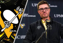 Pittsburgh Penguins GM Kyle Dubas speaking at a press conference, with the team logo in the background