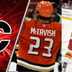 Calgary Flames Rumors: A Blockbuster McTavish-for-Andersson Trade Proposal Surfaces Mason McTavish skates in his Anaheim Ducks jersey, Rasmus Andersson in his Flames jersey, amidst persistent NHL trade rumors.