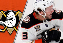 Anaheim Ducks forward Mason McTavish celebrates a goal during an NHL game, with the latest Ducks rumors swirling around his contract negotiations.