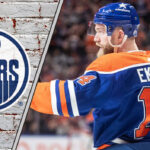 Edmonton Oilers defenseman Mattias Ekholm skates during an NHL game, highlighting the latest Oiler news on his contract negotiations.