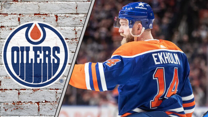 Edmonton Oilers defenseman Mattias Ekholm skates during an NHL game, highlighting the latest Oiler news on his contract negotiations.