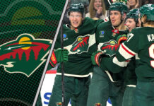 The Minnesota Wild team celebrating a goal on the ice during a game in the 2025-26 NHL season.