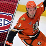 Mason McTavish celebrating a goal with a Montreal Canadiens logo to the left indicating the latest NHL Rumors