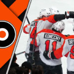 A close-up shot of the Philadelphia Flyers logo on a player's jersey during a game