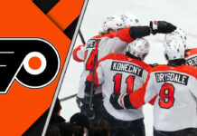 A close-up shot of the Philadelphia Flyers logo on a player's jersey during a game