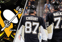 An action shot of Sidney Crosby and Evgeni Malkin skating in their Pittsburgh Penguins uniforms