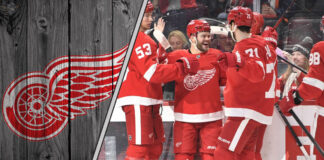 Detroit Red Wings players celebrating a preseason goal at Little Caesars Arena