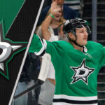 Roope Hintz Point Projections 2025-26: The Star Ready to Shine Brighter Roope Hintz in a Dallas Stars jersey, skating with the puck, ready for action, a dynamic shot capturing his intensity.