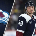 Colorado Avalanche defenseman Sam Girard skates with the puck, amidst recent NHL trade rumors.