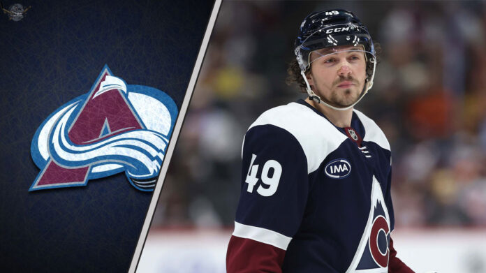 sam-girard-rumors-august-2-2025 Colorado Avalanche defenseman Sam Girard skates with the puck, amidst recent NHL trade rumors.