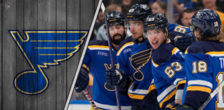 St. Louis Blues players celebrating a goal on the ice