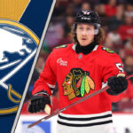Tyler Bertuzzi in his Chicago Blackhawks jersey skates during an NHL game, representing a potential trade target for the Buffalo Sabres