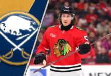 Tyler Bertuzzi in his Chicago Blackhawks jersey skates during an NHL game, representing a potential trade target for the Buffalo Sabres