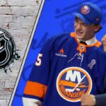 Matthew Schaefer the top Canadian NHL Draft pick 2025 posing with his new team jersey after being selected by the New York Islanders
