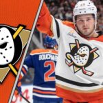 Anaheim Ducks forward Mason McTavish celebrates a goal during an NHL game, focused and determined.