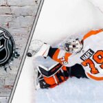 Carter Hart in his Flyers goalie gear, focused during a game, with the NHL logo superimposed on the background.