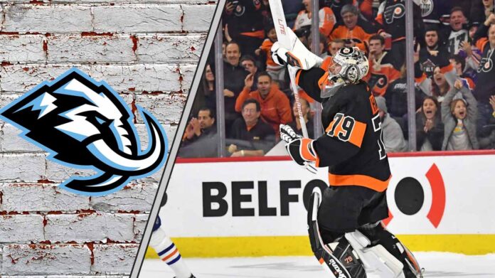 carter-hart-utah-mammoth-goalie Carter Hart in a Philadelphia Flyers jersey with the Utah Mammoth logo to the left