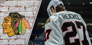 Chicago Blackhawks forward Lukas Reichel skates during an NHL game, looking to prove his value amidst recent NHL rumors