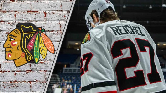 Chicago Blackhawks forward Lukas Reichel skates during an NHL game, looking to prove his value amidst recent NHL rumors