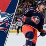 Columbus Blue Jackets forward Yegor Chinakhov celebrating a goal during an NHL game, representing the ongoing trade request situation.