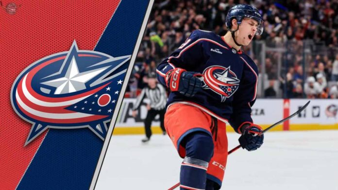 Columbus Blue Jackets forward Yegor Chinakhov celebrating a goal during an NHL game, representing the ongoing trade request situation.