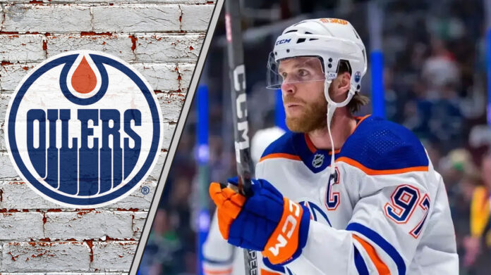 Edmonton Oilers captain Connor McDavid looking focused during a game, contemplating his future with the team amid contract extension talks.