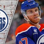 Is This the End? The Real Reason Connor McDavid is Hesitating with the Oilers dmonton Oilers captain Connor McDavid looks on thoughtfully during a game, contemplating his future with the team and a potential move to the Toronto Maple Leafs.