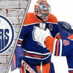 Edmonton Oilers’ Goaltending Gamble: A Championship Risk? Edmonton Oilers goalies Stuart Skinner and Calvin Pickard hug each other during an NHL game, contemplating the team's championship hopes and pressure.