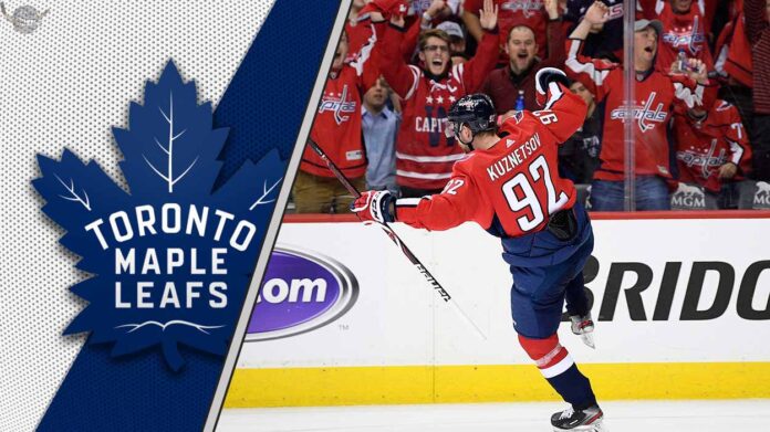 Evgeny Kuznetsov celebrates a goal, with the logo of the Toronto Maple Leafs visible in the background, representing his potential NHL return.
