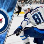 Winnipeg Jets star forward Kyle Connor skates with the puck during an NHL game