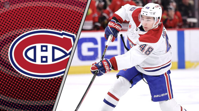 Lane Hutson in a Montreal Canadiens jersey quarterbacking the power play