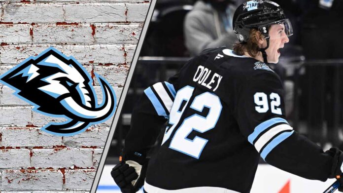 logan-cooley-point-projections-2025-26-fantasy Logan Cooley #92 of the Utah Mammoth skates with the puck during a game, poised for a breakout 2025-26 NHL season with projected 77 points