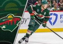 Minnesota Wild superstar Kirill Kaprizov skating during an NHL game, looking focused on the play.