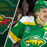 Minnesota Wild star Kirill Kaprizov celebrates a goal during an NHL game, with the future of his career with the team in question.