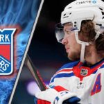 New York Rangers star Artemi Panarin skating with the puck at Madison Square Garden, contemplating his future with the team.