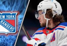 New York Rangers star Artemi Panarin skating with the puck at Madison Square Garden, contemplating his future with the team.