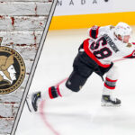 The 5 Prospects Who Will Make or Break the Ottawa Senators’ Future An action shot of top Ottawa Senators prospect Carter Yakemchuk on the ice, representing the future of the team.