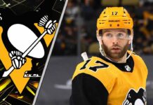 Pittsburgh Penguins forward Bryan Rust skates with the puck during an NHL game, with trade rumors swirling about his future with the team.