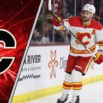 The Clock is Ticking: Inside the Rasmus Andersson Contract Standoff Calgary Flames defenseman Rasmus Andersson looks on during a game, with his contract situation and future with the team in question.