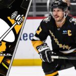 Sidney Crosby skates on the ice from the Pittsburgh Penguins home arena, a frustrated expression on his face, contemplating his future with the team.