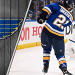 An image of the St. Louis Blues logo with action shot of top prospect Jimmy Snuggerud