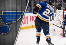 An image of the St. Louis Blues logo with action shot of top prospect Jimmy Snuggerud