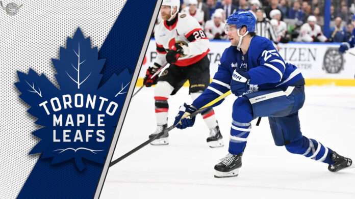 Toronto Maple Leafs defenseman Brandon Carlo skates during an NHL game, representing a key trade chip for the team's forward hunt.