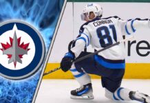 Winnipeg Jets star forward Kyle Connor celebrates a goal during an NHL game, looking to make a play as the team works to sign him to a new contract.