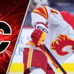 Calgary Flames center Nazem Kadri skates during an NHL game, as trade rumors swirl about his future with the team.